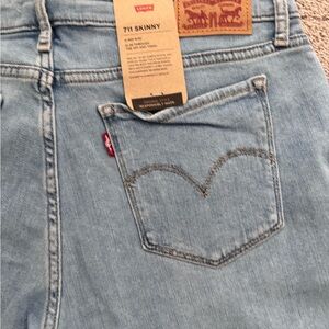 Levi's 711 Skinny Jeans in Light Blue 12 Medium 31x30 mid rise